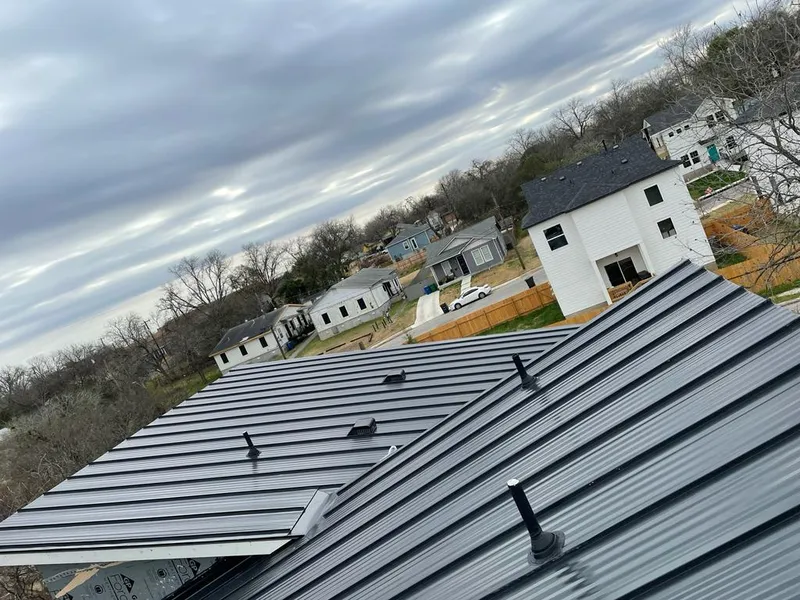 Standing seam metal roof panels with vents for Skylight Repair in North Star